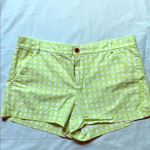 Green and white shorts.